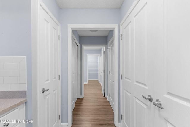 4331 Ivy Crest Cir, Louisville, KY 40241 - corridor featuring dark wood-type flooring and baseboards