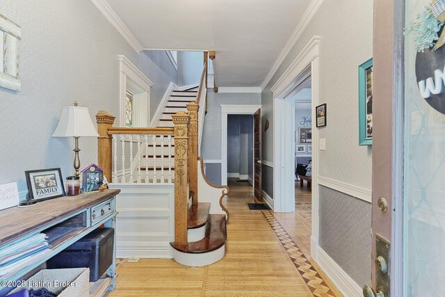 1331 Highland Ave, Louisville, KY 40204 - corridor featuring stairway, wood finished floors, and crown molding