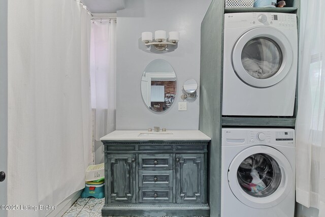 1331 Highland Ave, Louisville, KY 40204 - washroom with estacked washer and dryer and tile patterned flooring