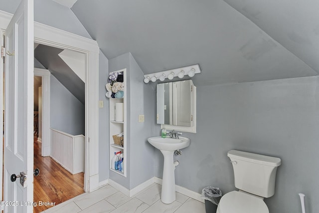1331 Highland Ave, Louisville, KY 40204 - bathroom with vaulted ceiling and toilet
