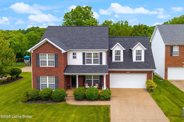 17804 Birch Bend Cir, Fisherville, KY 40023 - traditional-style house featuring brick siding, driveway, roof with shingles, a garage, and a front yard
