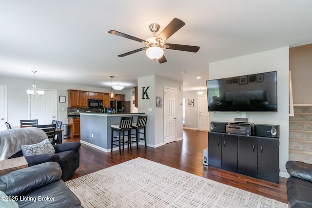 17804 Birch Bend Cir, Fisherville, KY 40023 - living area featuring dark wood-type flooring, ceiling fan, a chandelier, and recessed lighting