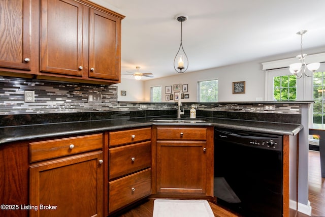 17804 Birch Bend Cir, Fisherville, KY 40023 - kitchen featuring dishwasher, decorative backsplash, brown cabinets, and decorative light fixtures