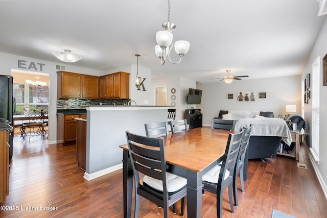 17804 Birch Bend Cir, Fisherville, KY 40023 - dining room featuring a chandelier, dark wood-style floors, and a ceiling fan