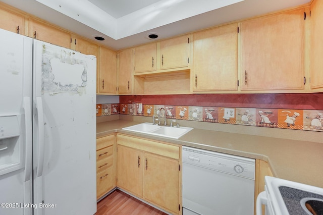 161 Thierman Ln Apt 1E, Louisville, KY 40207 - kitchen featuring white appliances, light countertops, and light wood-style floors