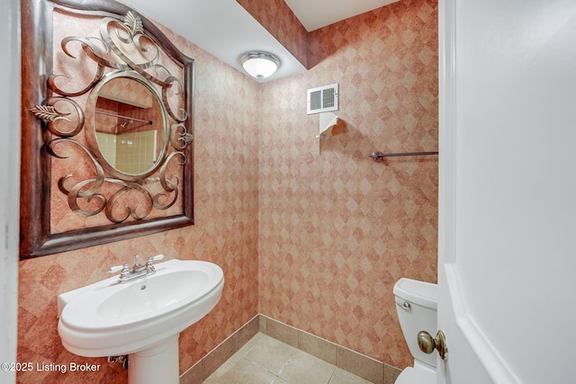 161 Thierman Ln Apt 1E, Louisville, KY 40207 - bathroom featuring tile patterned flooring and toilet