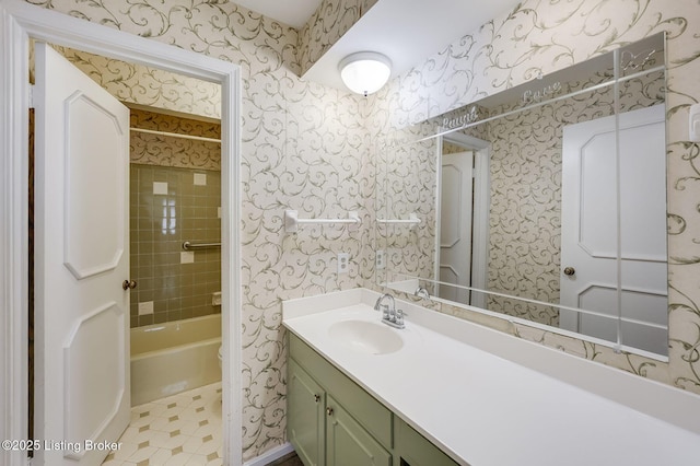 161 Thierman Ln Apt 1E, Louisville, KY 40207 - bathroom featuring vanity, wallpapered walls, and shower / tub combination