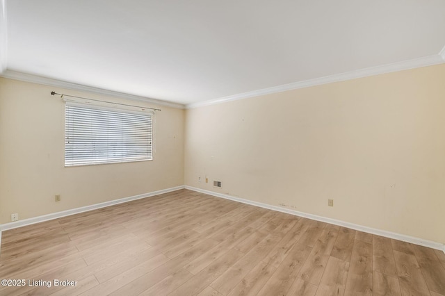 161 Thierman Ln Apt 1E, Louisville, KY 40207 - spare room with ornamental molding and light wood-style floors