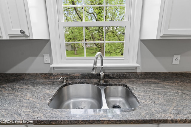 1908 Landing Rd, Prospect, KY 40059 - kitchen view of dark stone countertops and white cabinetry