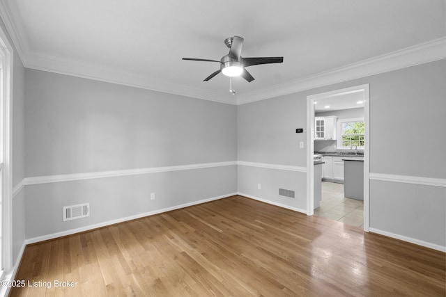 1908 Landing Rd, Prospect, KY 40059 - unfurnished room with light wood finished floors, a ceiling fan, and crown molding