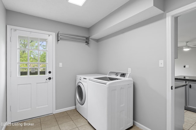 1908 Landing Rd, Prospect, KY 40059 - laundry area with independent washer and dryer, light tile patterned floors, and ceiling fan