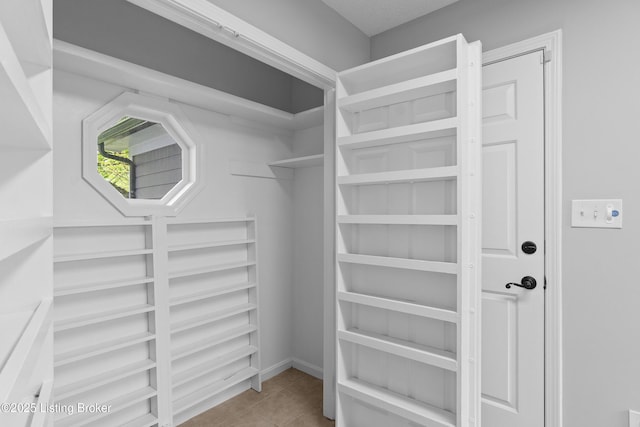 1908 Landing Rd, Prospect, KY 40059 - walk in closet with tile patterned floors