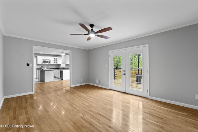 1908 Landing Rd, Prospect, KY 40059 - unfurnished living room with crown molding, a ceiling fan, light wood finished floors, and french doors