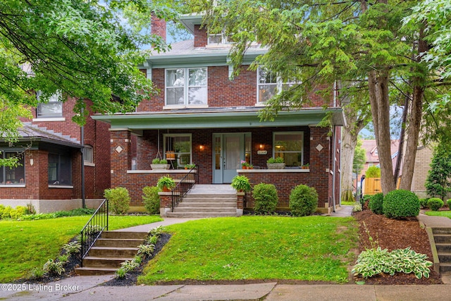 2144 Baringer Ave, Louisville, KY 40204 - traditional style home featuring a chimney, covered porch, a front lawn, and brick siding