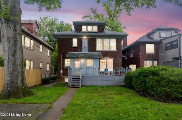 2144 Baringer Ave, Louisville, KY 40204 - view of front of house featuring brick siding and board and batten siding