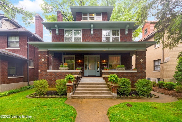 2144 Baringer Ave, Louisville, KY 40204 - traditional style home with a porch and brick siding