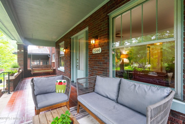 2144 Baringer Ave, Louisville, KY 40204 - wooden porch featuring an outdoor living space