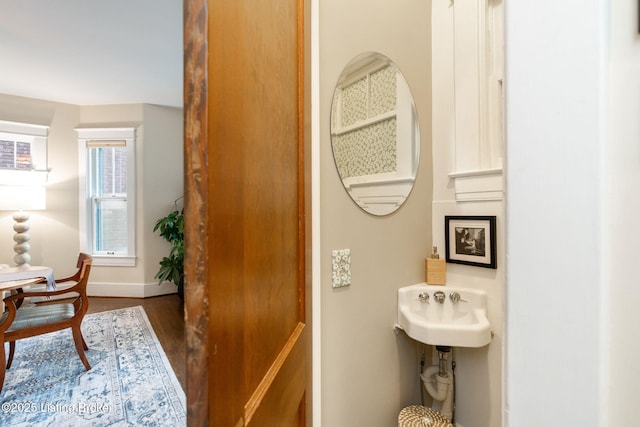 2144 Baringer Ave, Louisville, KY 40204 - bathroom featuring wood finished floors and baseboards