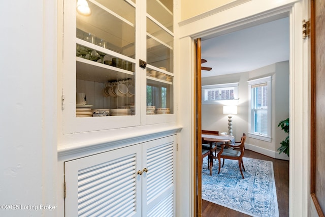 2144 Baringer Ave, Louisville, KY 40204 - corridor with dark wood-type flooring and baseboards