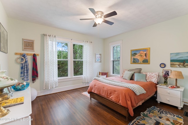 2144 Baringer Ave, Louisville, KY 40204 - bedroom featuring multiple windows, wood finished floors, and ceiling fan