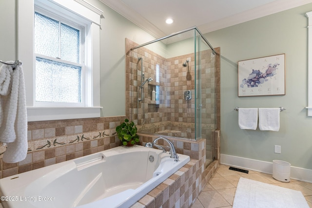 2144 Baringer Ave, Louisville, KY 40204 - full bathroom featuring ornamental molding, a bath, a shower stall, and tile patterned flooring