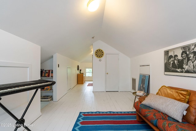 2144 Baringer Ave, Louisville, KY 40204 - bedroom featuring light wood-style flooring and vaulted ceiling
