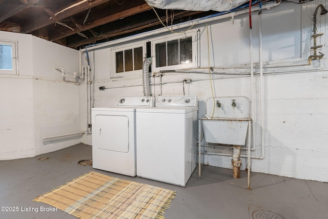 2144 Baringer Ave, Louisville, KY 40204 - below grade area with separate washer and dryer and a sink