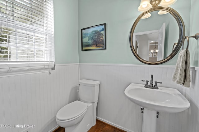 3903 Zaring Mill Ct, Louisville, KY 40241 - bathroom featuring wainscoting, wood finished floors, and a chandelier