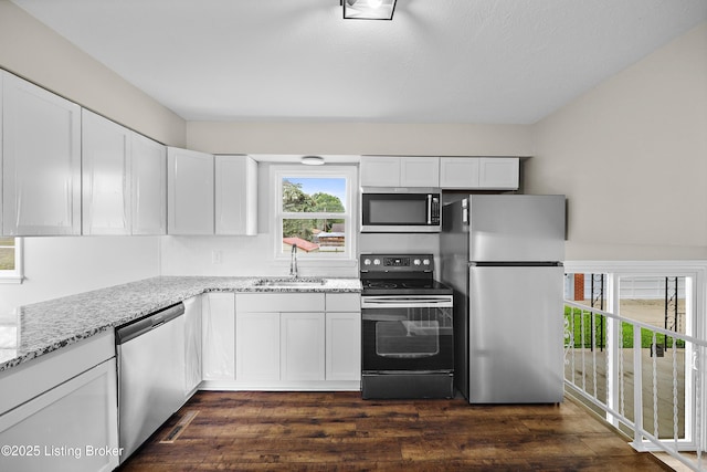 6218 Helenjean Way, Louisville, KY 40272 - kitchen featuring stainless steel appliances, white cabinets, and light stone counters