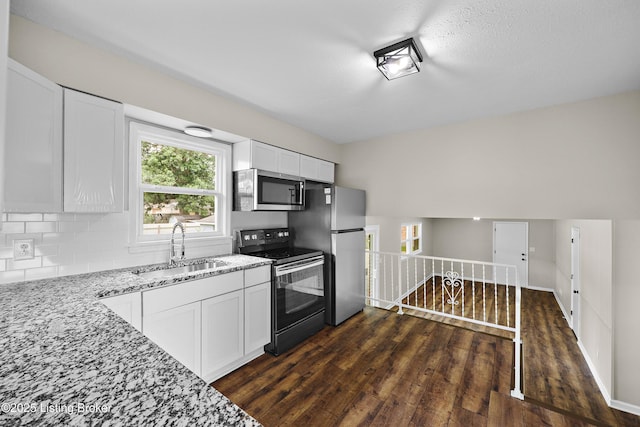 6218 Helenjean Way, Louisville, KY 40272 - kitchen with appliances with stainless steel finishes, light stone counters, dark wood-style floors, backsplash, and white cabinets