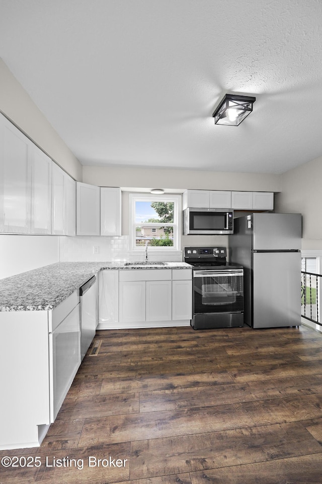 6218 Helenjean Way, Louisville, KY 40272 - kitchen with appliances with stainless steel finishes, dark wood-style flooring, and healthy amount of natural light