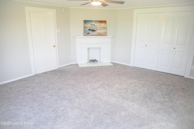 6099 Bloomfield Rd, Springfield, KY 40069 - unfurnished living room featuring a ceiling fan, carpet flooring, a fireplace, and ornamental molding
