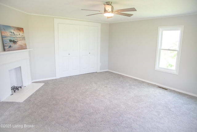 6099 Bloomfield Rd, Springfield, KY 40069 - unfurnished living room with ceiling fan, crown molding, and carpet floors