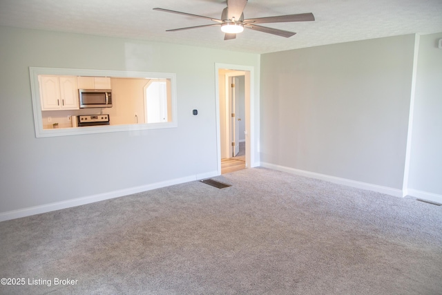 6099 Bloomfield Rd, Springfield, KY 40069 - unfurnished living room featuring ceiling fan and carpet floors