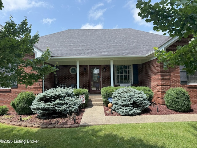 117 Deep Springs Dr, Bardstown, KY 40004 - view of front of property featuring a shingled roof, brick siding, and covered porch
