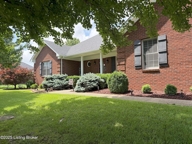 117 Deep Springs Dr, Bardstown, KY 40004 - view of front of house with a front yard, brick siding, and roof with shingles