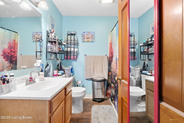 101 Bond St, Lawrenceburg, KY 40342 - bathroom featuring wood finished floors, vanity, and a shower with shower curtain
