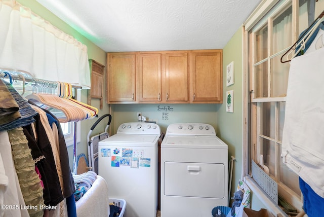 101 Bond St, Lawrenceburg, KY 40342 - washroom featuring cabinet space, separate washer and dryer, and a textured ceiling
