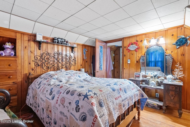 101 Bond St, Lawrenceburg, KY 40342 - bedroom featuring wood finished floors and wooden walls