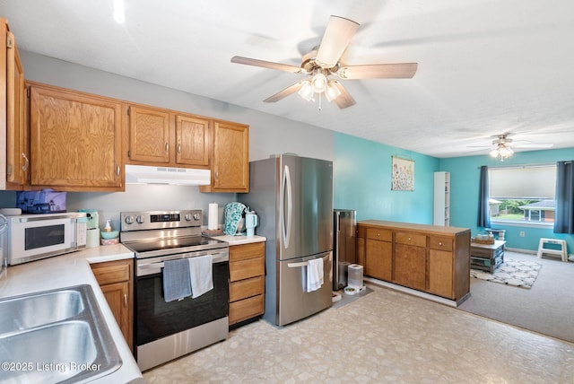 101 Bond St, Lawrenceburg, KY 40342 - kitchen with appliances with stainless steel finishes, under cabinet range hood, a ceiling fan, and light countertops