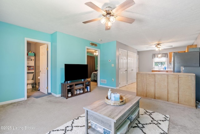 101 Bond St, Lawrenceburg, KY 40342 - living room with ceiling fan, light carpet, and a textured ceiling