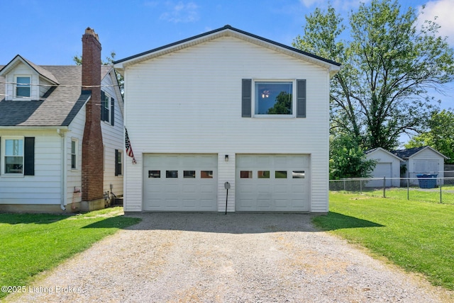 101 Bond St, Lawrenceburg, KY 40342 - view of side of home featuring driveway, a garage, and a chimney