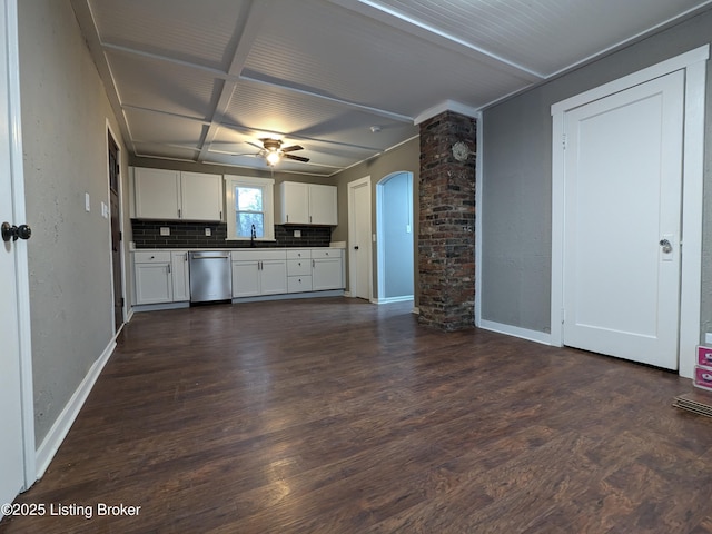 4100 Puppers Ct, Louisville, KY 40213 - kitchen with dishwasher, dark wood-type flooring, ceiling fan, white cabinetry, and arched walkways