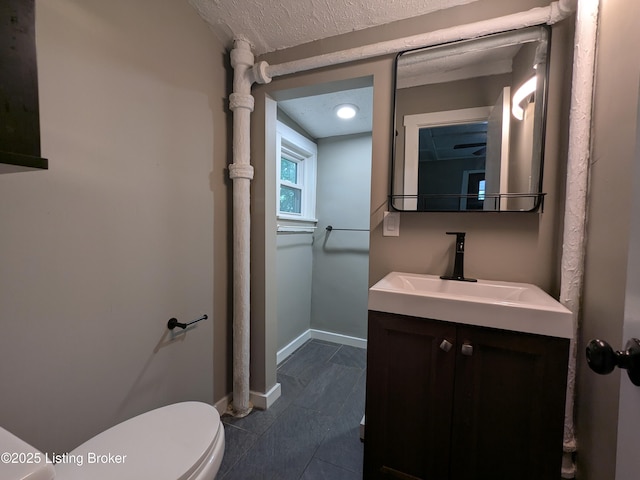 4100 Puppers Ct, Louisville, KY 40213 - bathroom featuring vanity, a textured ceiling, and tile patterned floors