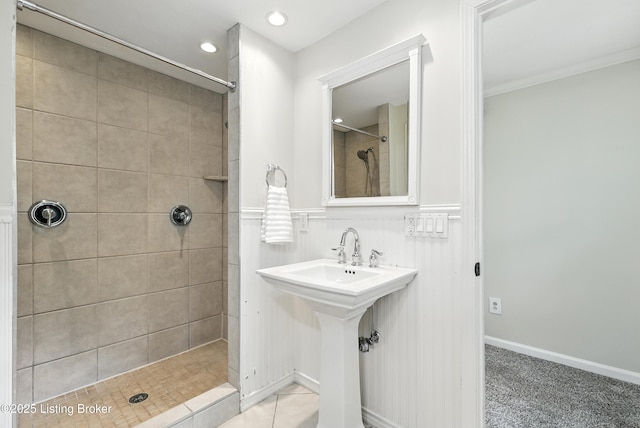 335 Ridgeway Ave, Louisville, KY 40207 - bathroom with a tile shower, recessed lighting, and crown molding