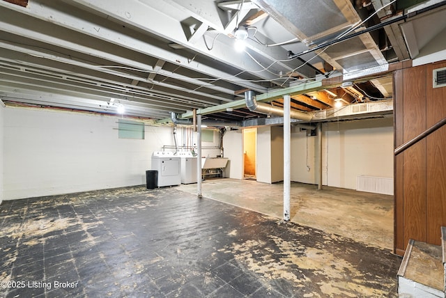 335 Ridgeway Ave, Louisville, KY 40207 - unfinished basement featuring washer and clothes dryer and a sink