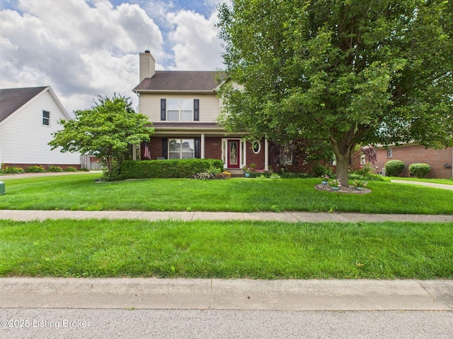 6408 Autumn Oak Way, Louisville, KY 40272 - view of front facade with a chimney, a front lawn, and brick siding