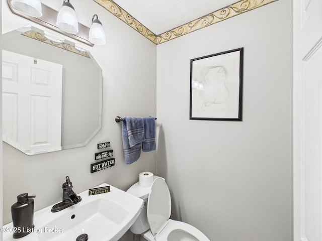 6408 Autumn Oak Way, Louisville, KY 40272 - half bath with a sink and a textured ceiling