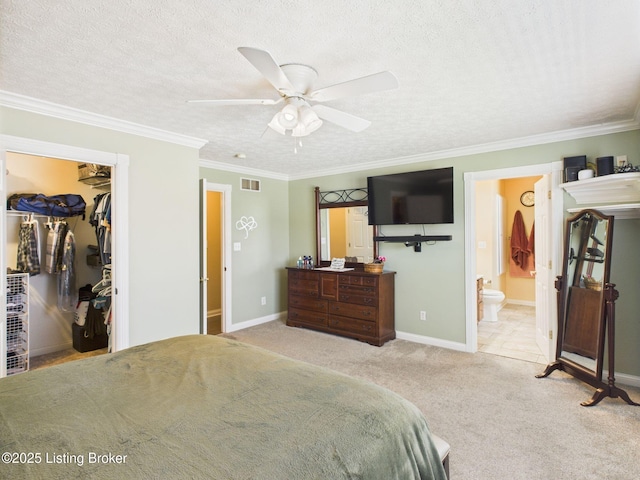6408 Autumn Oak Way, Louisville, KY 40272 - carpeted bedroom featuring a spacious closet, a textured ceiling, crown molding, a closet, and ensuite bath
