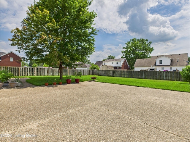6408 Autumn Oak Way, Louisville, KY 40272 - fenced backyard with a patio area and a residential view